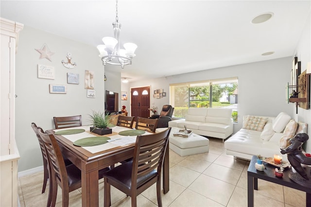 7022 Talbot Dr, Orlando, FL 32819 - dining room featuring a chandelier and light tile patterned floors