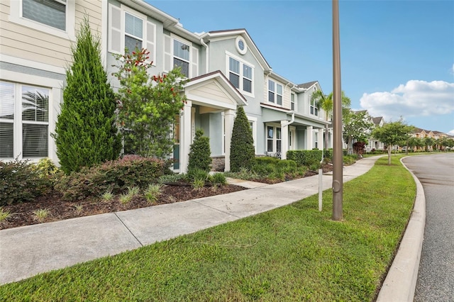 10009 Randal Walk St, Orlando, FL 32832 - multi unit property featuring a residential view and a front yard