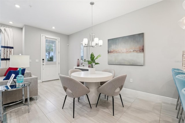 10009 Randal Walk St, Orlando, FL 32832 - dining room featuring a chandelier and recessed lighting