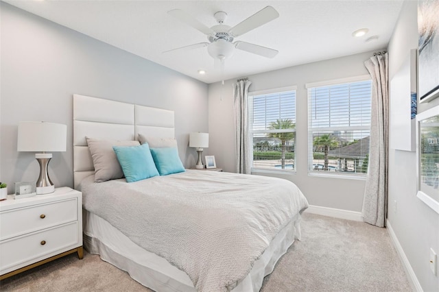10009 Randal Walk St, Orlando, FL 32832 - bedroom with light carpet, ceiling fan, and recessed lighting