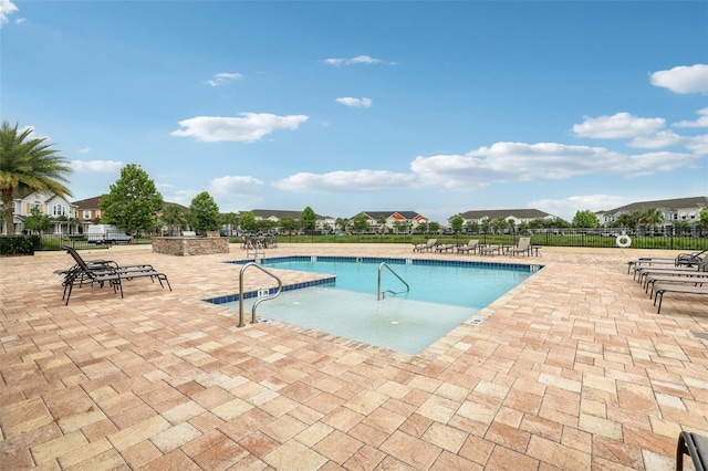 10009 Randal Walk St, Orlando, FL 32832 - community pool featuring a patio area