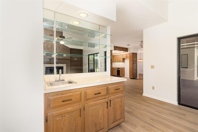 1424 Mt Laurel Dr, Winter Springs, FL 32708 - bathroom with a ceiling fan, wood finished floors, and vanity