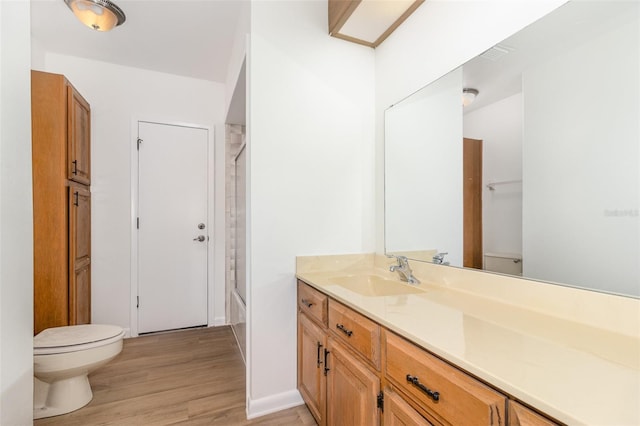 1424 Mt Laurel Dr, Winter Springs, FL 32708 - full bathroom with vanity, wood finished floors, and enclosed tub / shower combo