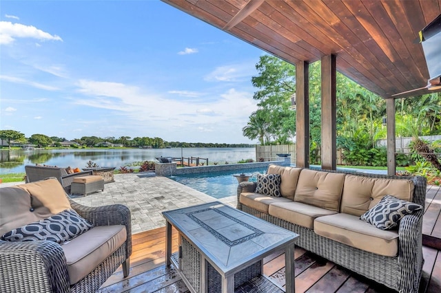 7801 Georgeann St, Winter Park, FL 32792 - fenced backyard with an outdoor hangout area and a water view