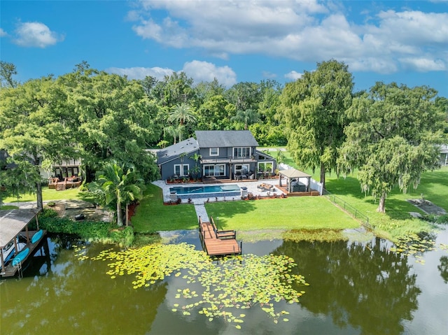 7801 Georgeann St, Winter Park, FL 32792 - rear view of property featuring an outdoor pool and a water view