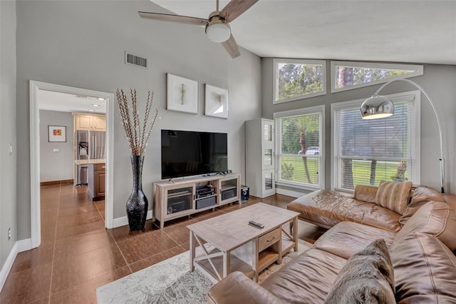 7801 Georgeann St, Winter Park, FL 32792 - living room featuring a ceiling fan and high vaulted ceiling