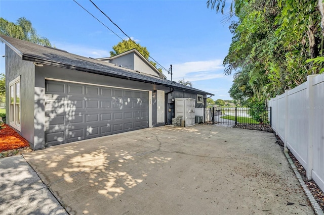 7801 Georgeann St, Winter Park, FL 32792 - view of side of home with stucco siding