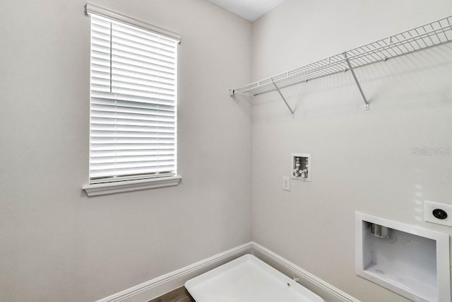 16146 Point Rock Dr, Winter Garden, FL 34787 - washroom featuring hookup for an electric dryer, hookup for a washing machine, and healthy amount of natural light