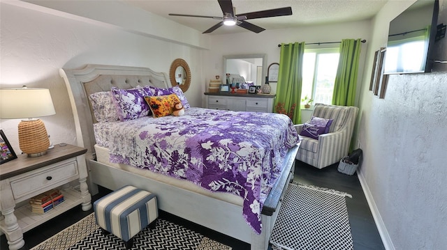 145 N Halifax Ave Unit 705, Daytona Beach, FL 32118 - bedroom with a textured wall and a ceiling fan