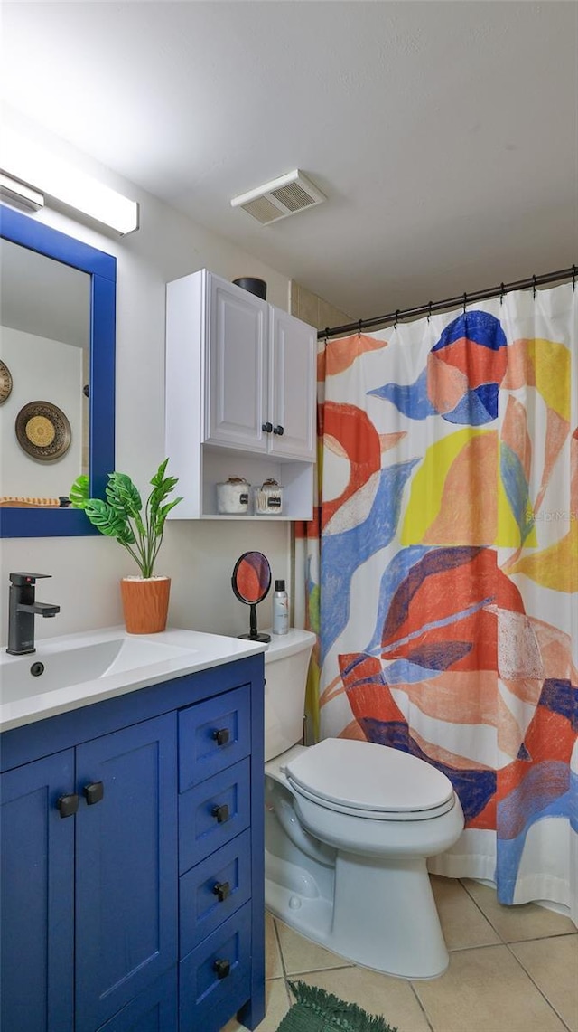 145 N Halifax Ave Unit 705, Daytona Beach, FL 32118 - full bath featuring vanity, tile patterned floors, and curtained shower