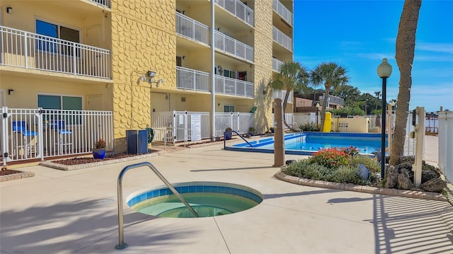 145 N Halifax Ave Unit 705, Daytona Beach, FL 32118 - community pool featuring a hot tub