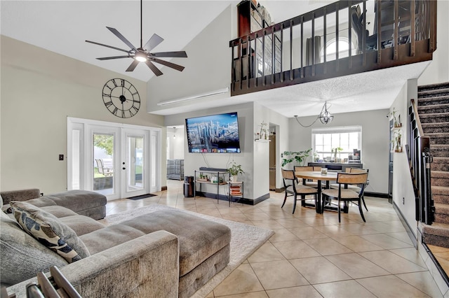 2235 Meadowmouse St, Orlando, FL 32837 - living area featuring light tile patterned flooring, high vaulted ceiling, and a ceiling fan