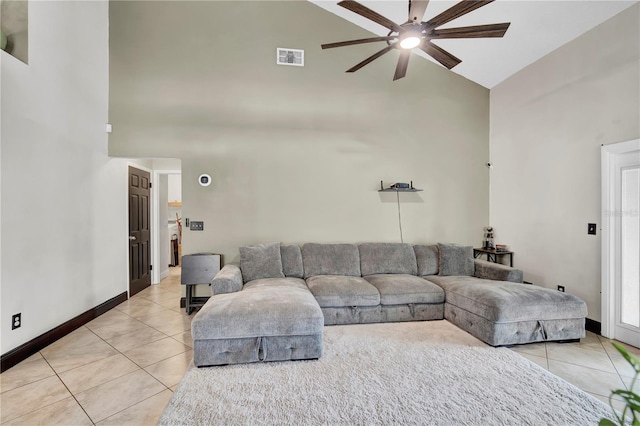 2235 Meadowmouse St, Orlando, FL 32837 - living room featuring high vaulted ceiling, light tile patterned flooring, and ceiling fan