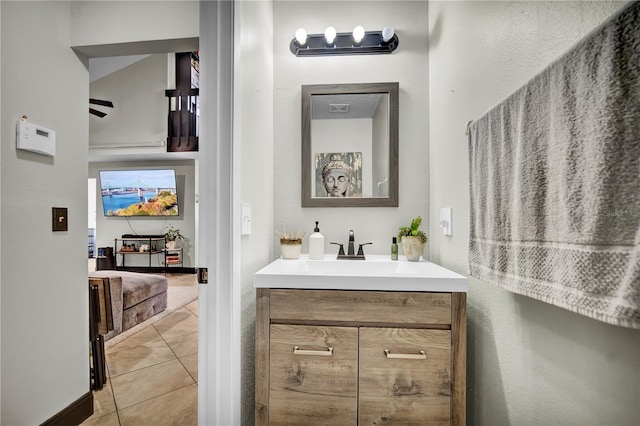 2235 Meadowmouse St, Orlando, FL 32837 - bathroom featuring vanity and tile patterned floors