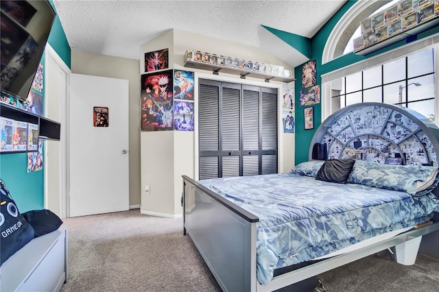 2235 Meadowmouse St, Orlando, FL 32837 - bedroom with carpet floors, a closet, and a textured ceiling