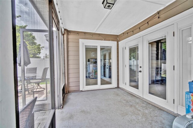 2235 Meadowmouse St, Orlando, FL 32837 - unfurnished sunroom with french doors