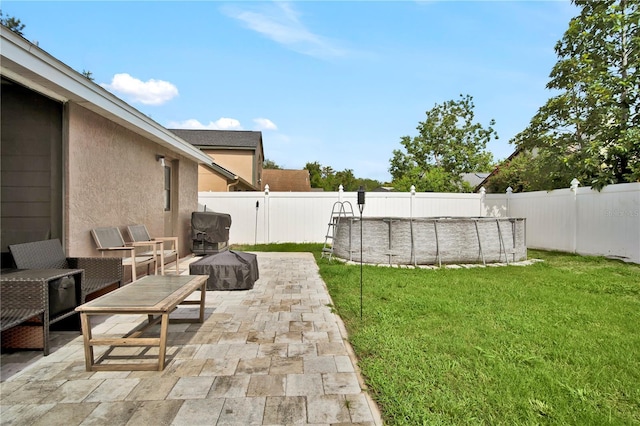 2235 Meadowmouse St, Orlando, FL 32837 - fenced backyard featuring a patio