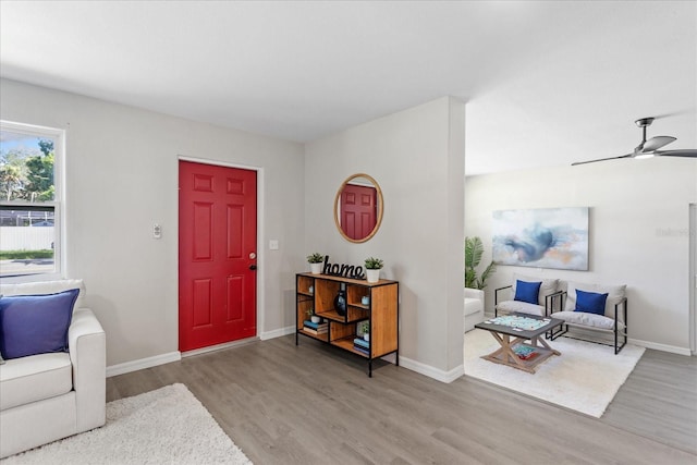 370 Hand Ave, Ormond Beach, FL 32174 - entryway featuring wood finished floors and ceiling fan