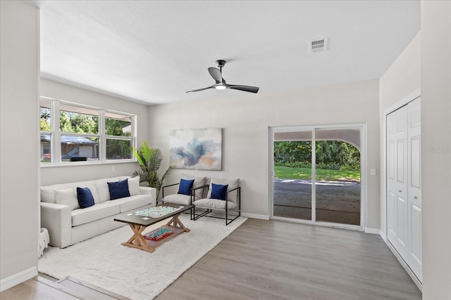 370 Hand Ave, Ormond Beach, FL 32174 - living room featuring wood finished floors and a ceiling fan