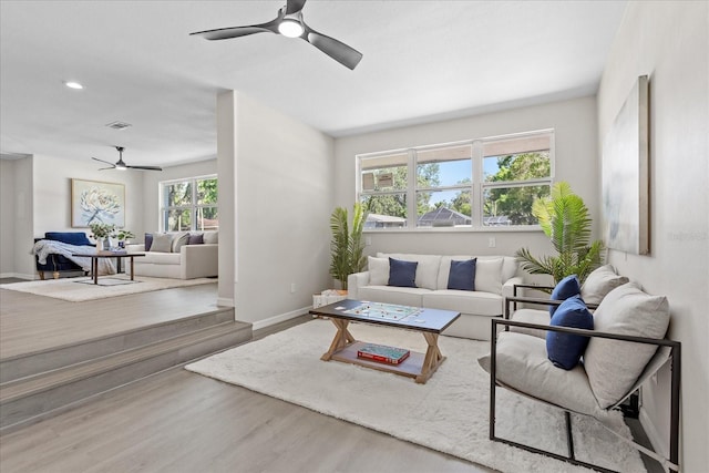 370 Hand Ave, Ormond Beach, FL 32174 - living room with a ceiling fan, wood finished floors, and recessed lighting