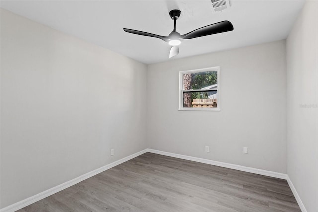 370 Hand Ave, Ormond Beach, FL 32174 - unfurnished room featuring ceiling fan and wood finished floors