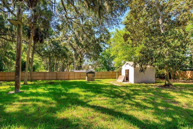 370 Hand Ave, Ormond Beach, FL 32174 - fenced backyard featuring a storage shed