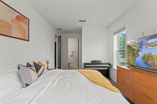 12468 Koshiba Aly, Orlando, FL 32827 - bedroom featuring wood finished floors and baseboards