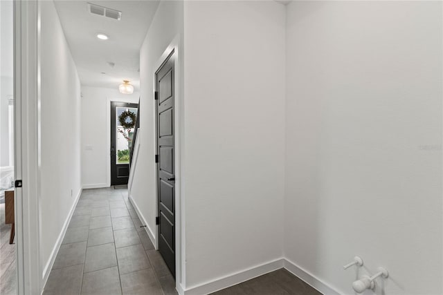 12468 Koshiba Aly, Orlando, FL 32827 - hall with baseboards and dark tile patterned floors