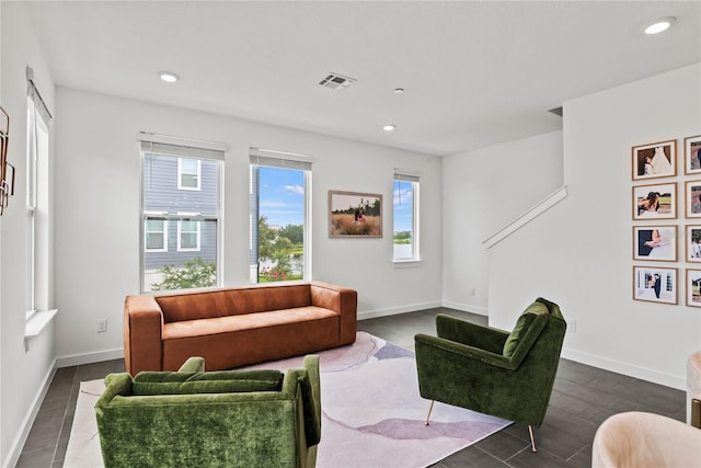 12468 Koshiba Aly, Orlando, FL 32827 - living room featuring recessed lighting and dark wood-style floors