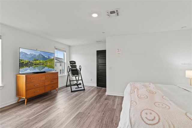 12468 Koshiba Aly, Orlando, FL 32827 - bedroom with wood finished floors and recessed lighting