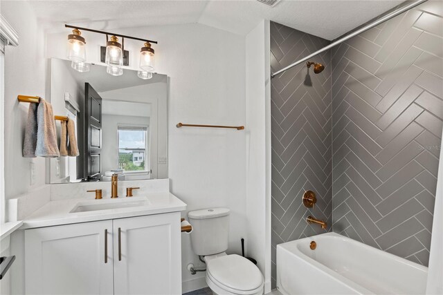 12468 Koshiba Aly, Orlando, FL 32827 - full bath with vanity, shower / bathtub combination, vaulted ceiling, and a textured ceiling