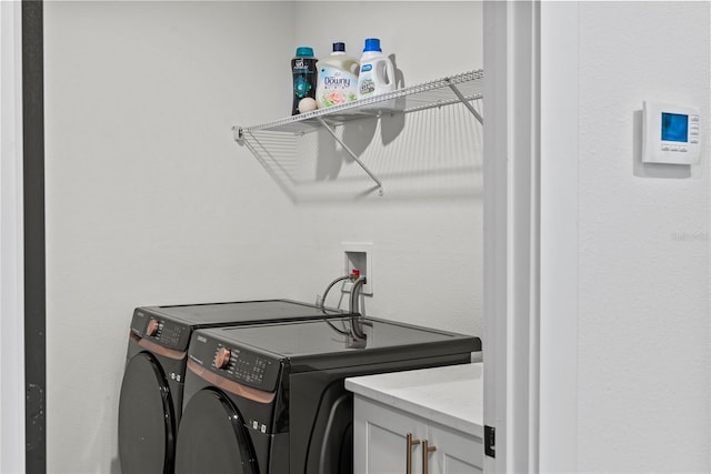 12468 Koshiba Aly, Orlando, FL 32827 - laundry room with separate washer and dryer and cabinet space