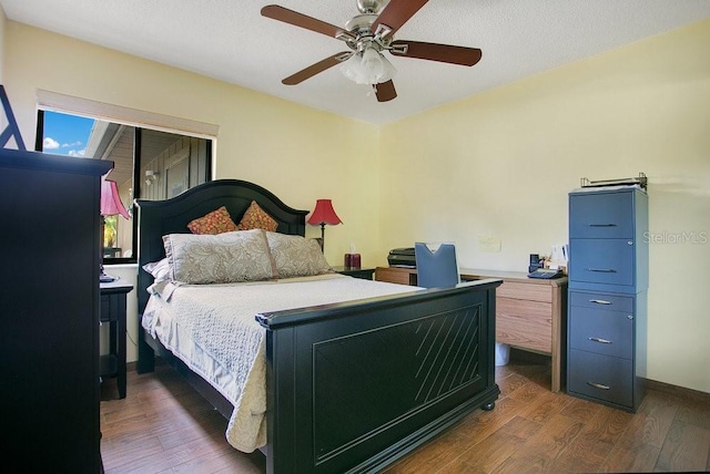 545 Mystic Wood St, Casselberry, FL 32707 - bedroom with dark wood finished floors and a ceiling fan