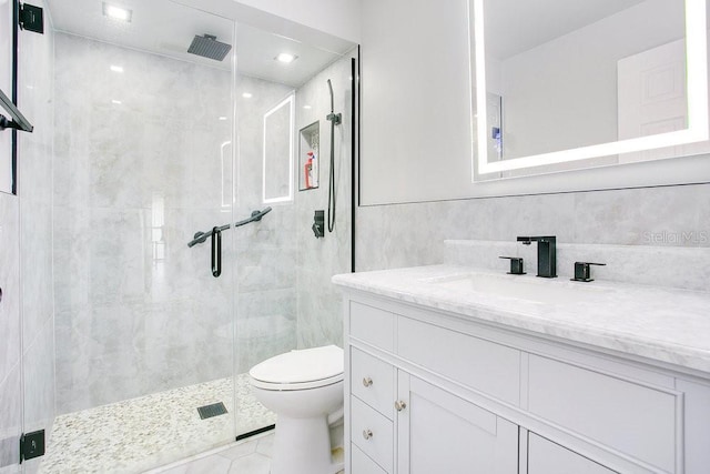545 Mystic Wood St, Casselberry, FL 32707 - full bathroom featuring a stall shower, vanity, and tile walls
