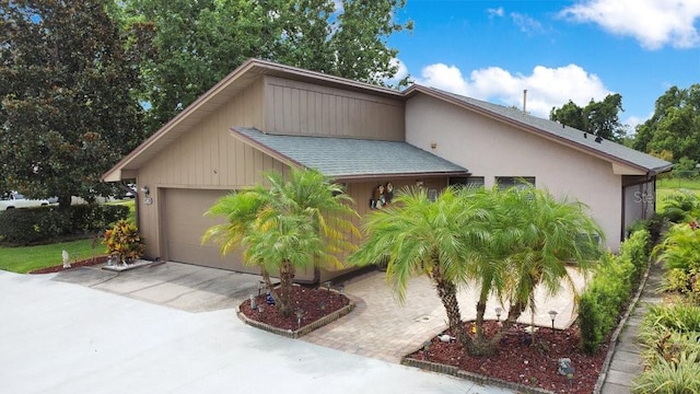 545 Mystic Wood St, Casselberry, FL 32707 - view of front facade featuring driveway and a garage