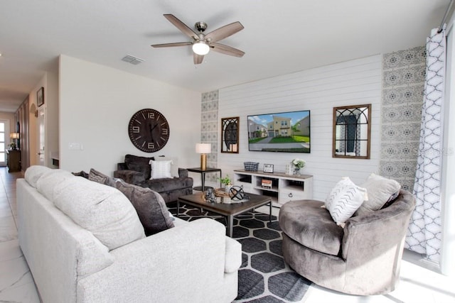 8982 Cabot Cliffs Dr, Davenport, FL 33896 - living area featuring a ceiling fan