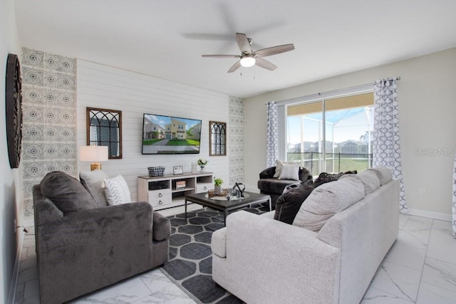 8982 Cabot Cliffs Dr, Davenport, FL 33896 - living room featuring light marble finish flooring and ceiling fan