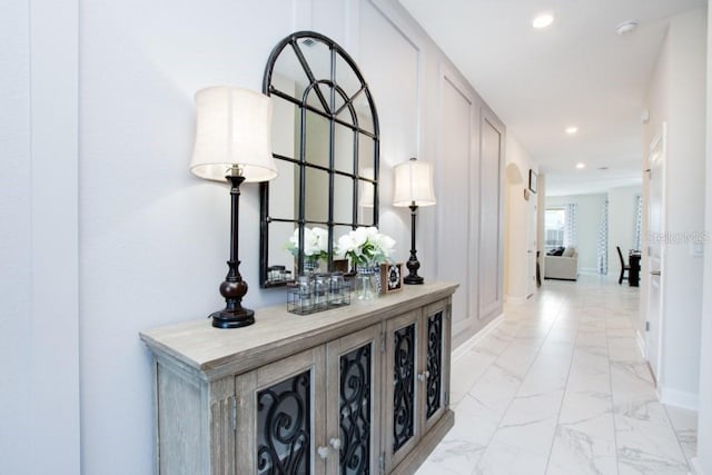 8982 Cabot Cliffs Dr, Davenport, FL 33896 - corridor with light marble finish floors and recessed lighting