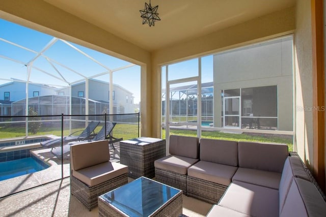 8982 Cabot Cliffs Dr, Davenport, FL 33896 - sunroom featuring a jacuzzi and outdoor lounge area