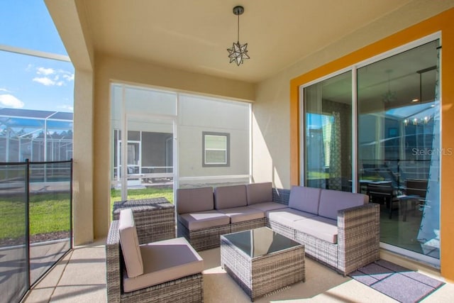 8982 Cabot Cliffs Dr, Davenport, FL 33896 - view of patio with outdoor lounge area and a lanai