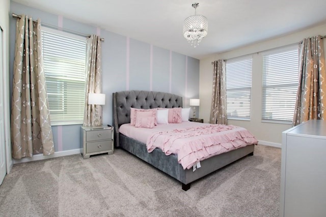 8982 Cabot Cliffs Dr, Davenport, FL 33896 - bedroom with carpet flooring and a chandelier