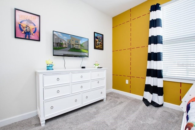 8982 Cabot Cliffs Dr, Davenport, FL 33896 - bedroom with light colored carpet and baseboards