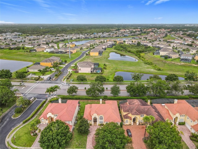 2209 Callaway Ct, Davenport, FL 33837 - aerial view of property and surrounding area featuring nearby suburban area and a large body of water