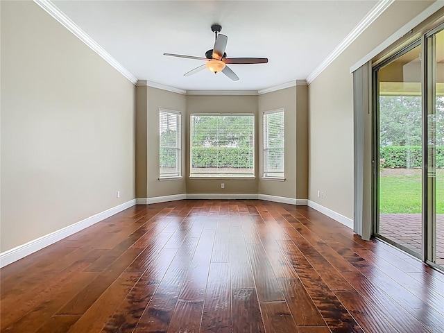 2209 Callaway Ct, Davenport, FL 33837 - spare room featuring dark wood-style floors, ceiling fan, and ornamental molding
