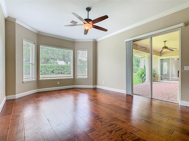2209 Callaway Ct, Davenport, FL 33837 - empty room with a ceiling fan, wood-type flooring, and crown molding