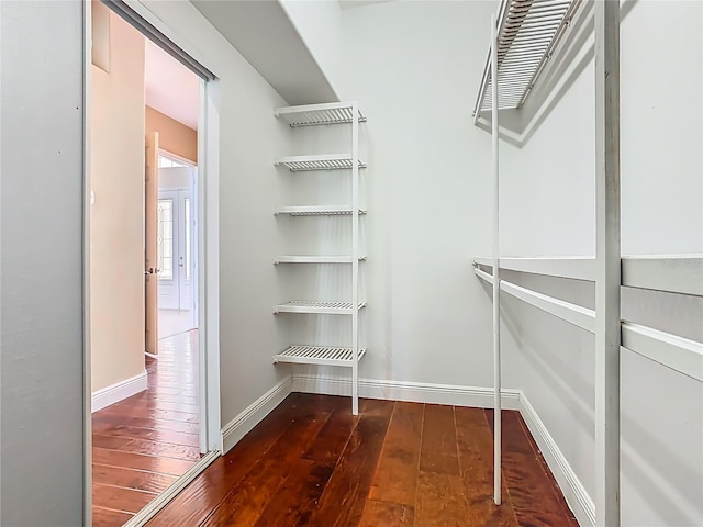2209 Callaway Ct, Davenport, FL 33837 - walk in closet featuring hardwood / wood-style flooring