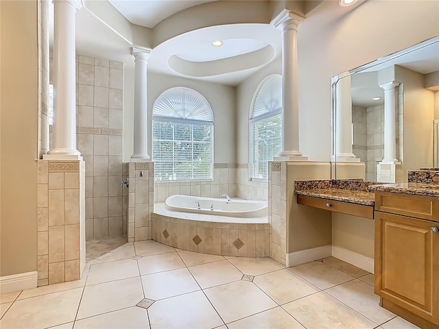 2209 Callaway Ct, Davenport, FL 33837 - bathroom featuring a bath, decorative columns, vanity, and tile patterned floors
