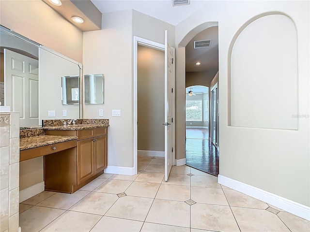 2209 Callaway Ct, Davenport, FL 33837 - bathroom featuring vanity, tile patterned flooring, recessed lighting, and a ceiling fan