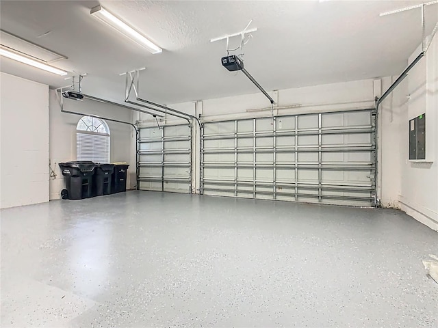 2209 Callaway Ct, Davenport, FL 33837 - garage with a garage door opener and electric panel