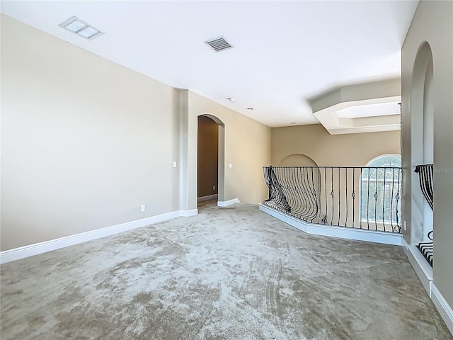 2209 Callaway Ct, Davenport, FL 33837 - carpeted spare room with arched walkways and baseboards